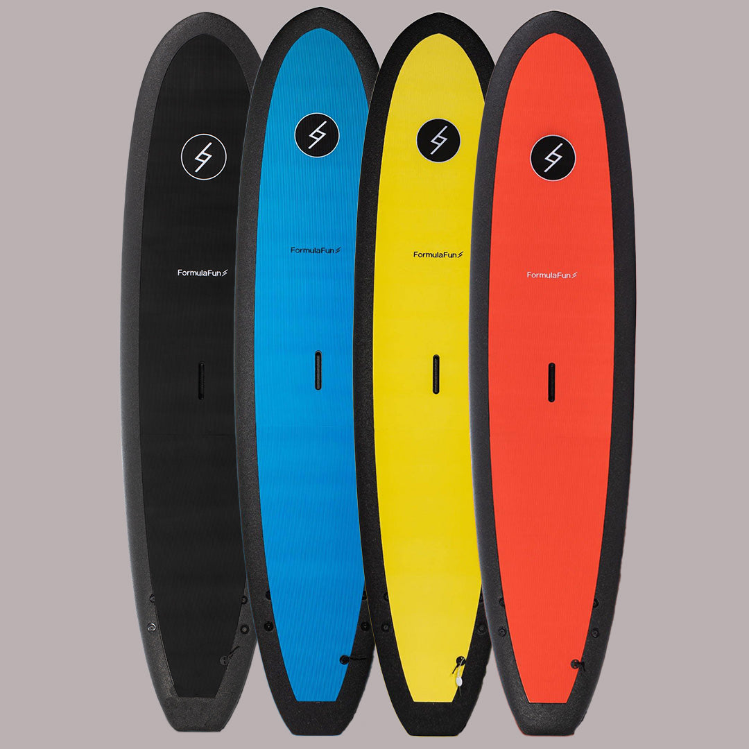 A black, a blue, a yellow and a red 7 foot 10 inch Formula Fun Foamies DOHO surfboard on a grey background