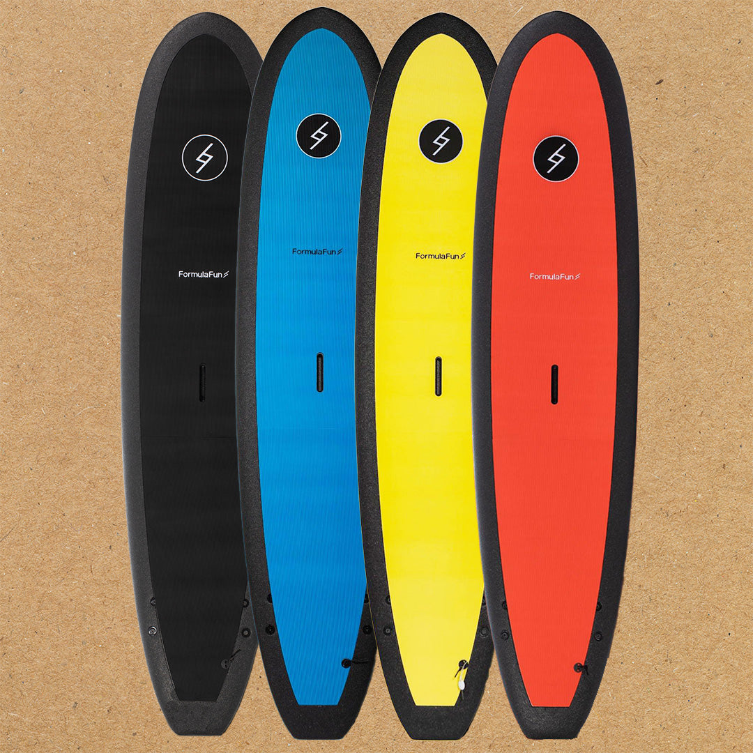 A black, a blue, a yellow and a red 7 foot 10 inch Formula Fun Foamies DOHO surfboard on a light brown background