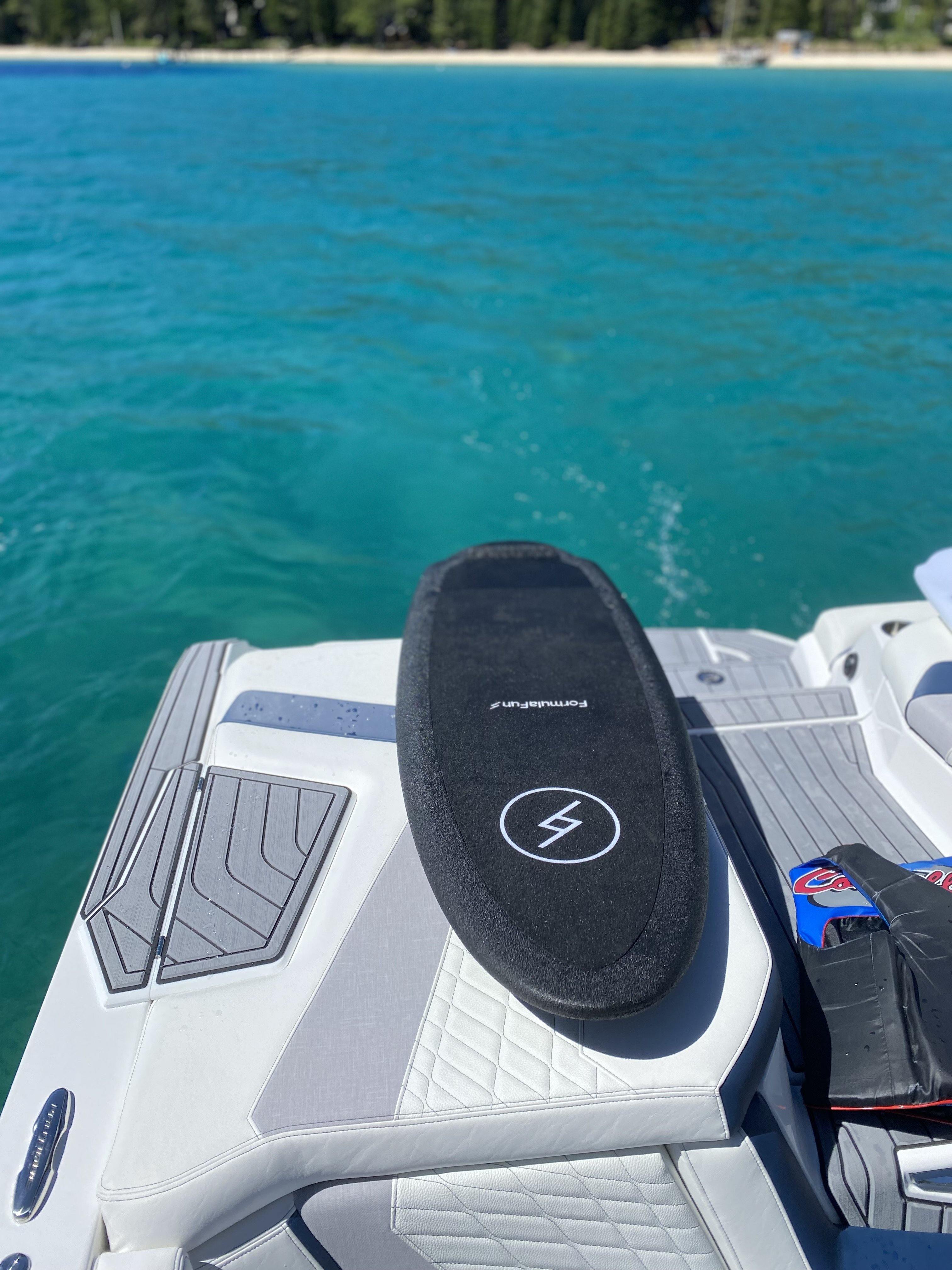 A black 4 foot 8 inch Formula Fun Rubicon on back of boat