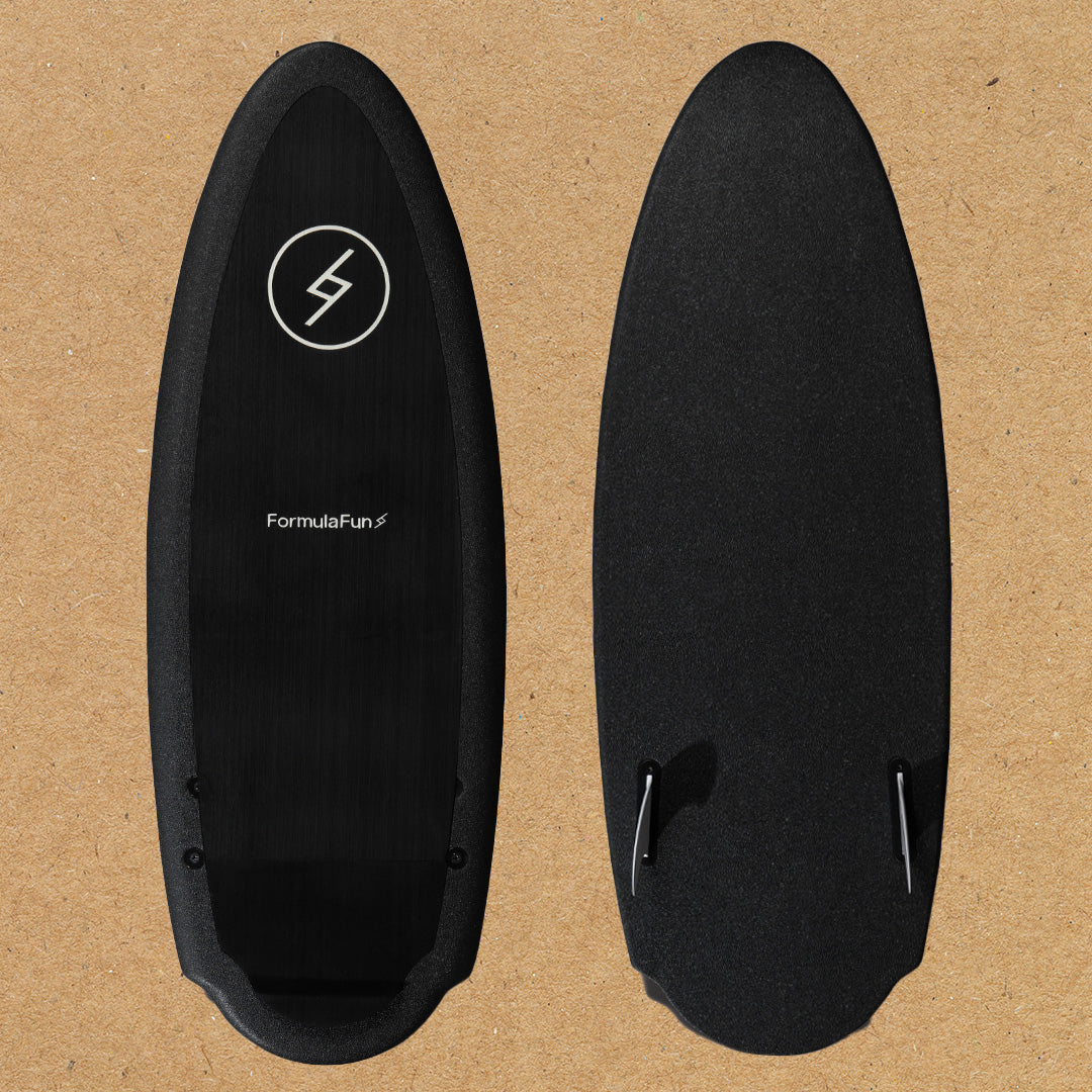 Front and back of a black 4 foot 8 inch Formula Fun Foamies Rubicon Wake surfboard on a light brown background.