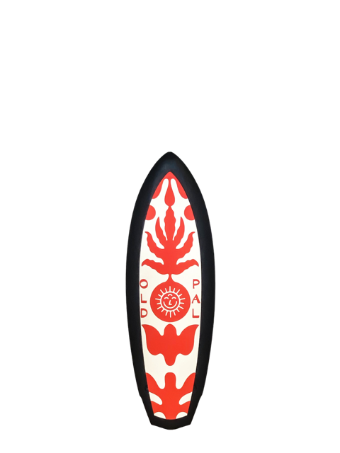 A black 4 foot 10 inch Album Seaskate surfboard with a white and red old pal illustration on a transparent background