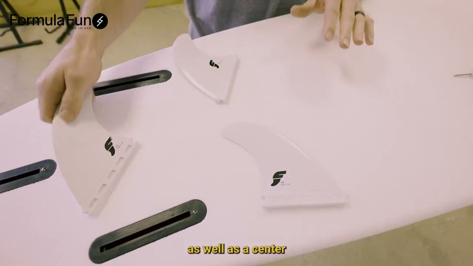 Three Zippers fins placed beside their fin boxes in the official demonstration